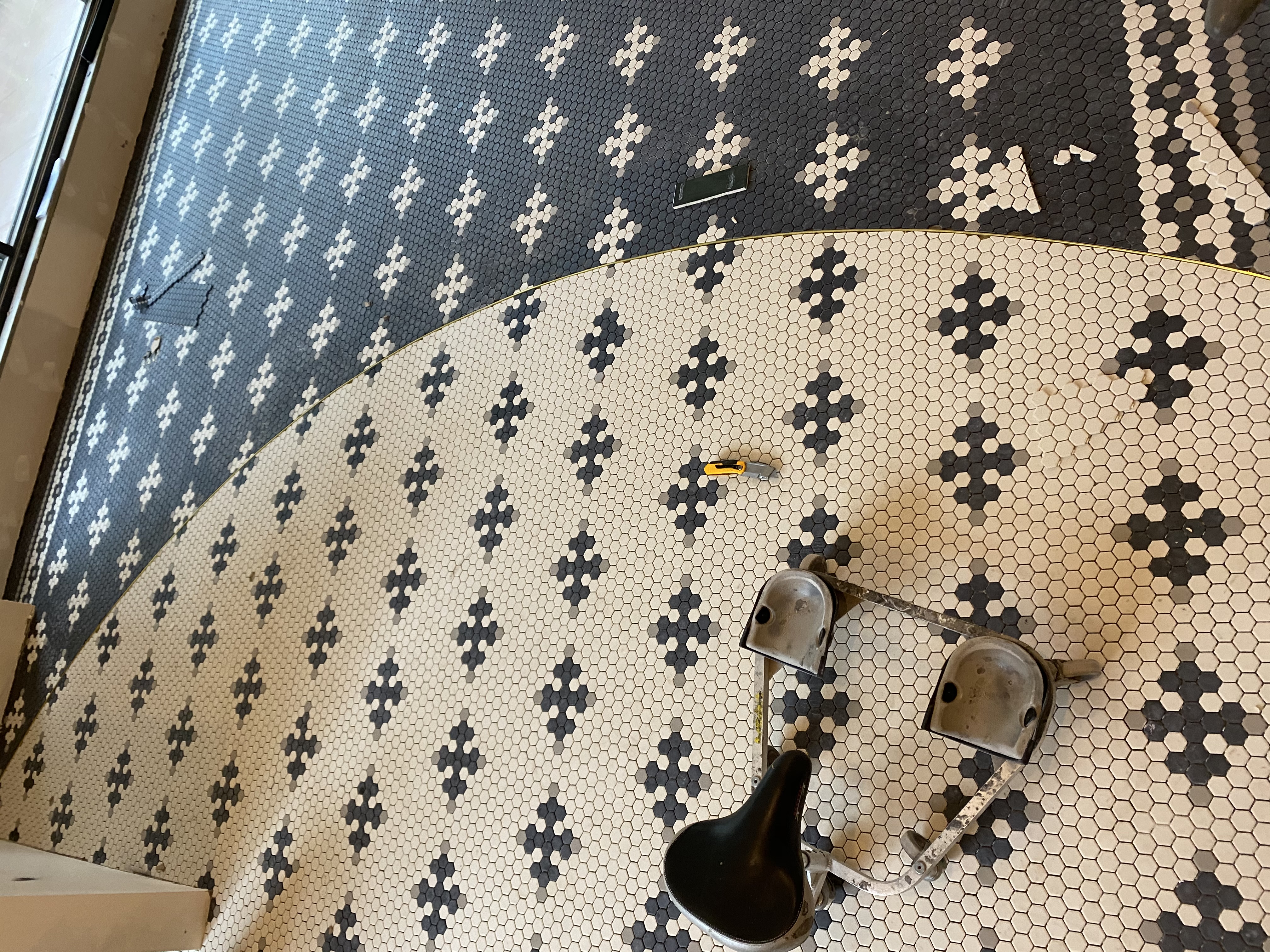 Patterned tile floor work in progress by Ballard Paint & Flooring in Seattle